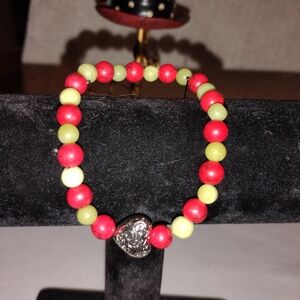 Handmade Red and Green Glass Beaded Bracelet with a Silver Heart Charm